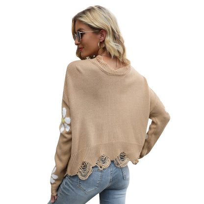V-neck pullovers  loose long-sleeved sweater autumn, winter with small flower accents.